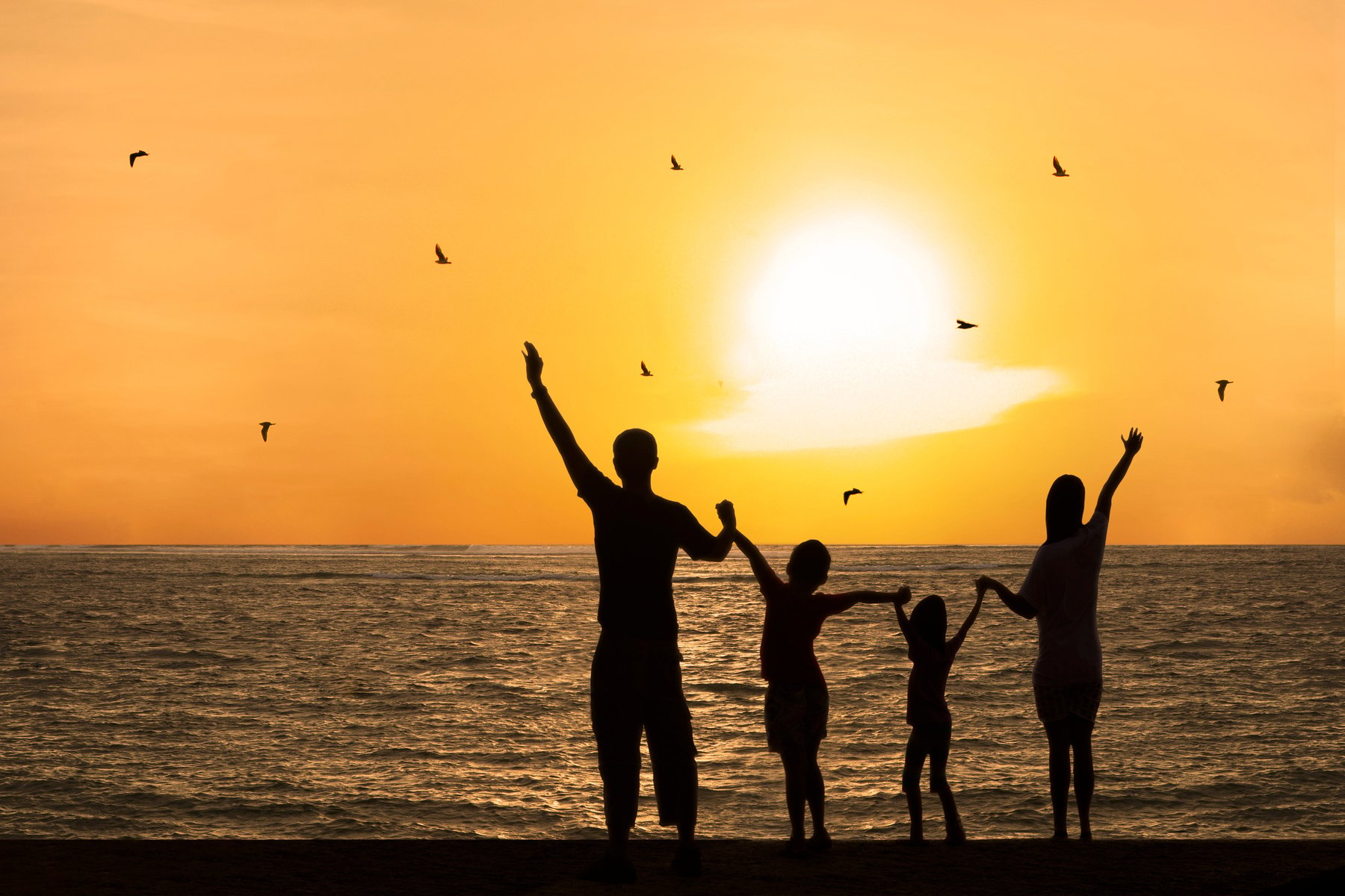 Happy Family Watching Sunset